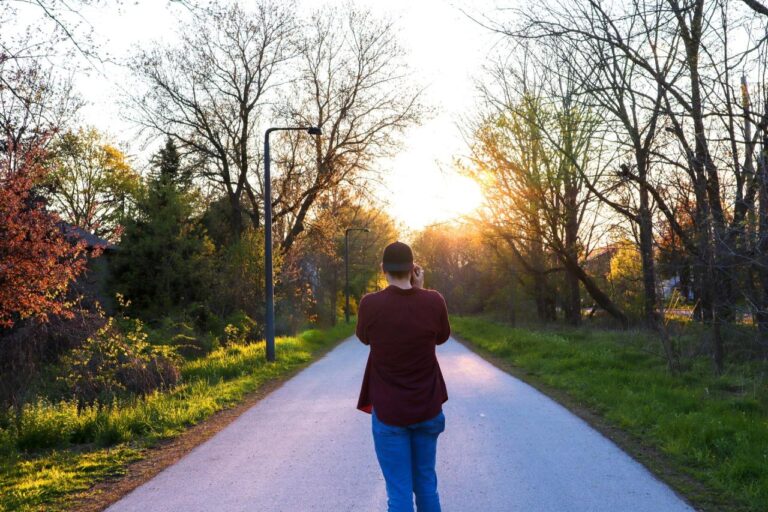 man walking in a park in winter