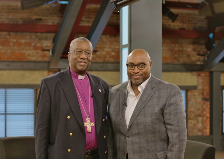 Archbishop Doye Agama talking with Bishop Wayne Malcolm