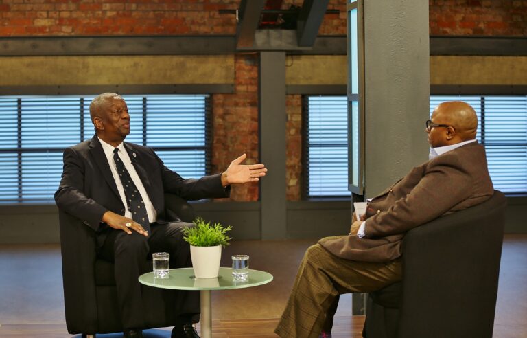 Archbishop Doye Agama talking with Bishop Wayne Malcolm