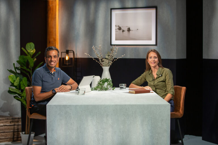 Man and woman at a desk together