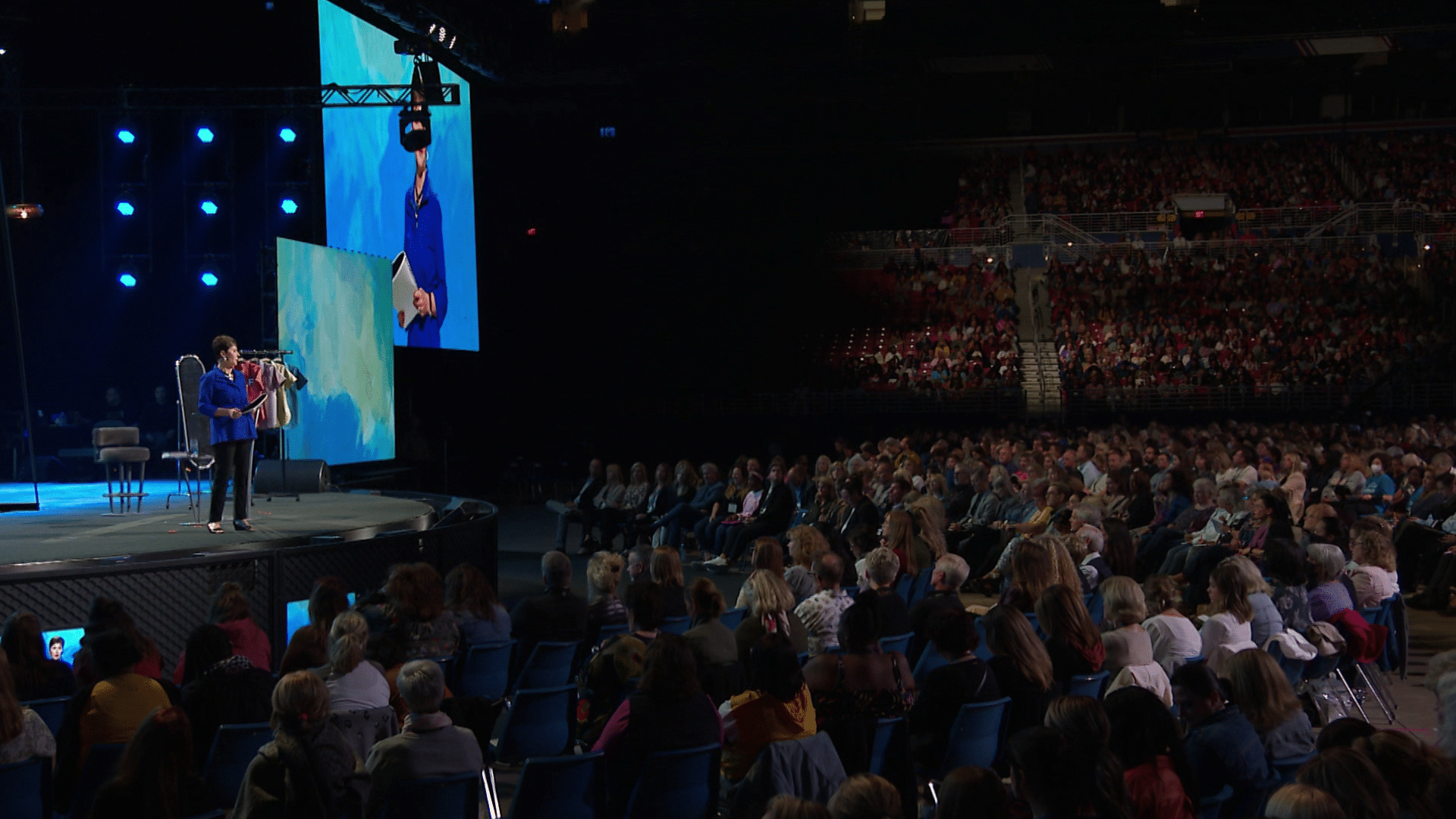 Joyce Meyer preaching to a crowd