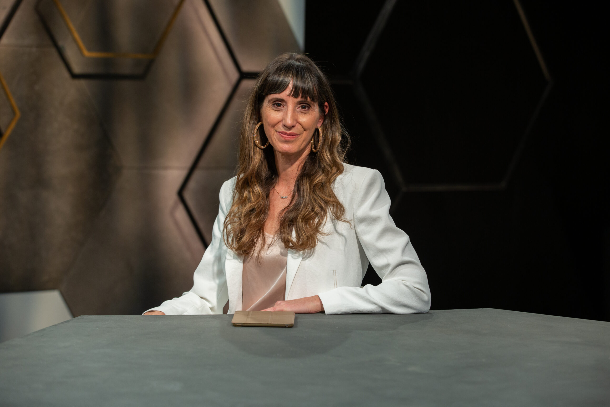 Tania Harris at a desk