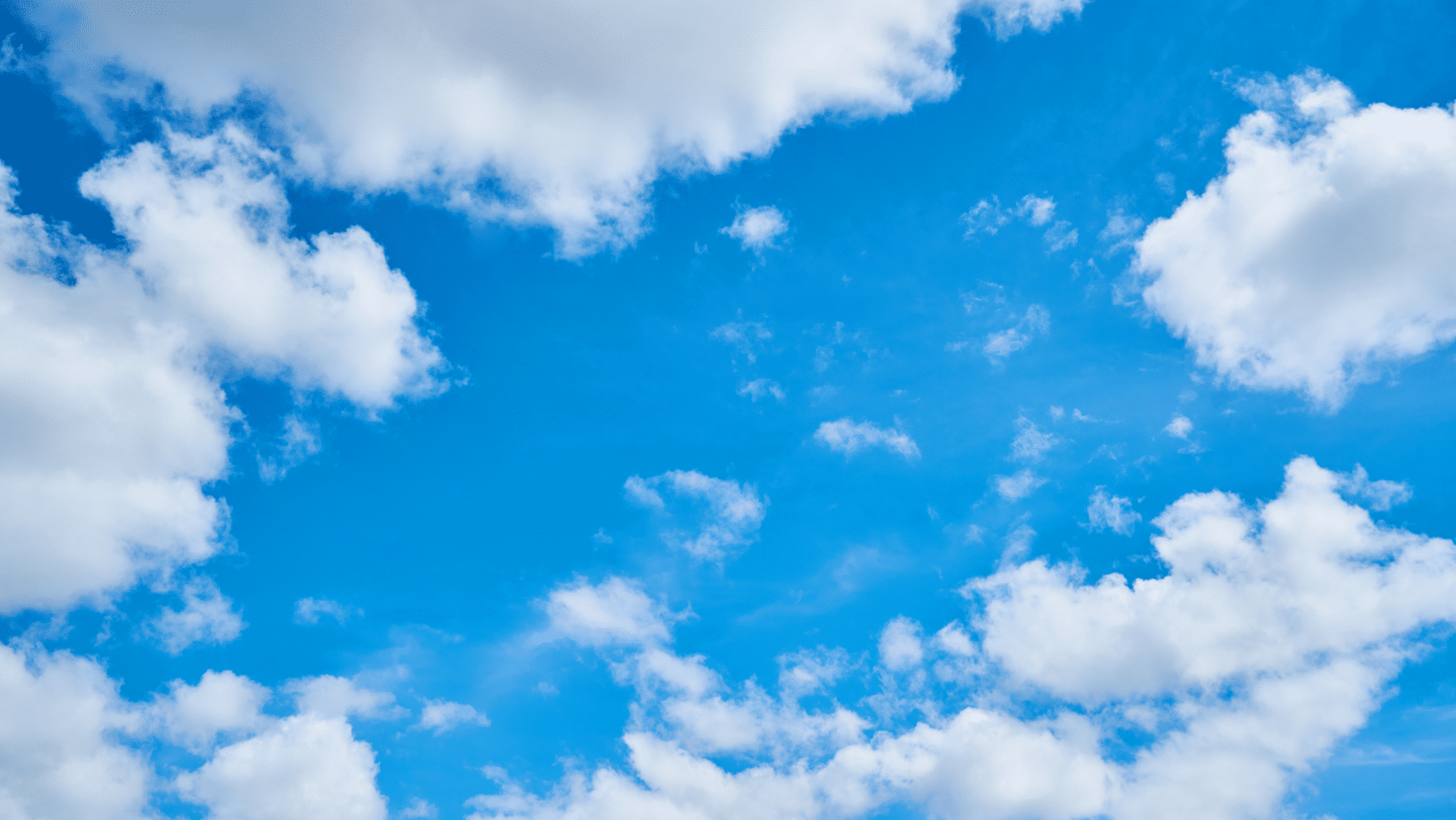 white clouds in a blue sky