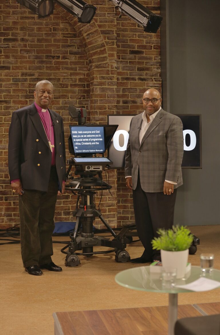 Archbishop Doye Agama talking with Bishop Wayne Malcolm