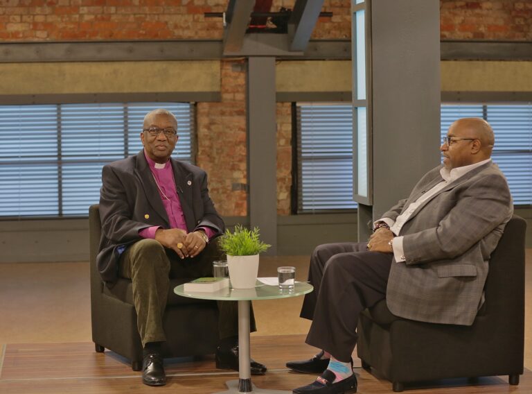 Archbishop Doye Agama talking with Bishop Wayne Malcolm