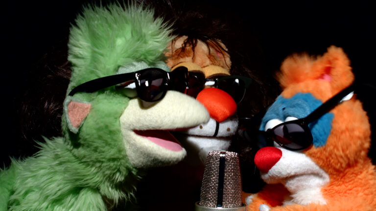 puppets singing with sunglasses