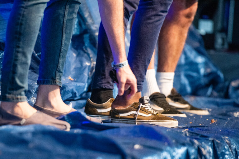 Youths wearing a variety of shoes